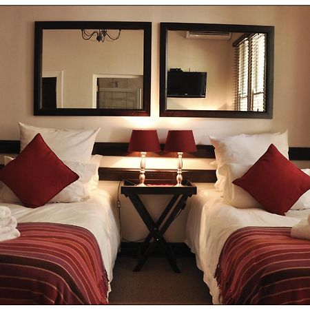 Lemon & Lime Guesthouse Bloemfontein Værelse billede